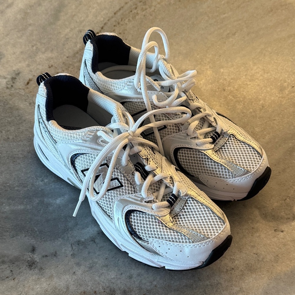 White silver and navy NB sneakers
